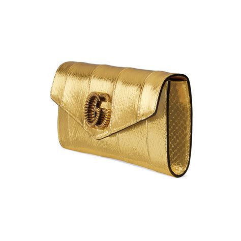 gucci gold stitch envelope clutch|Gucci snakeskin clutch.